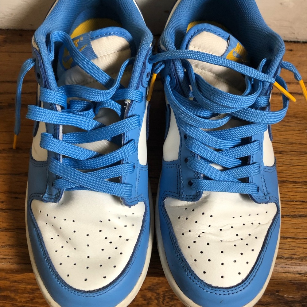 University Blue and White Nike Dunk Low Retro Sneakers